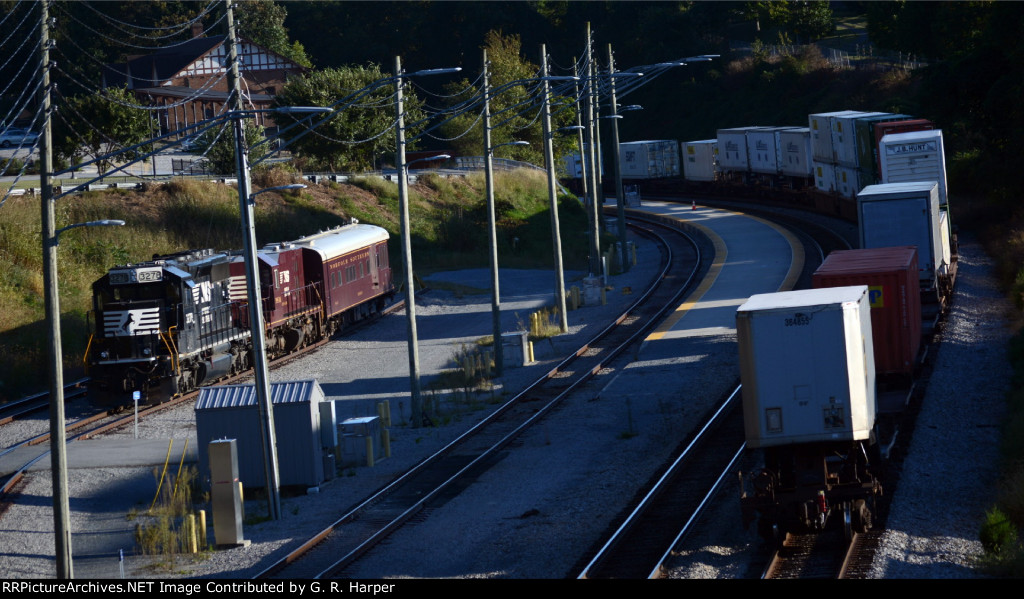 Rear of NS train 25A passes the NS research train.